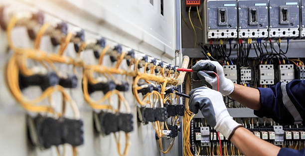 Professional Electrician technician working in Lula, GA
